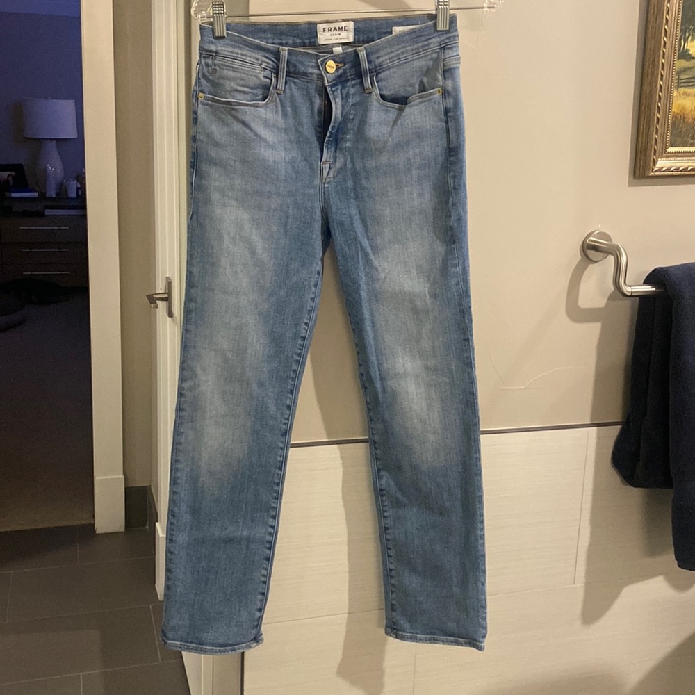 Frame “Le High Straight” jeans.